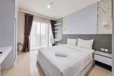 臥室 Cozy and Good Studio at Patraland Amarta Apartment By Travelio