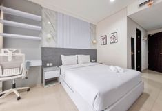 臥室 3 Cozy and Good Studio at Patraland Amarta Apartment By Travelio