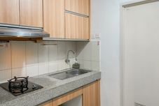 พื้นที่สาธารณะ Homey and Best Deal Studio Grand Sentraland Karawang Apartment By Travelio