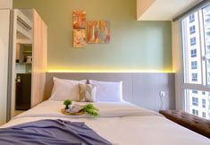 Bedroom 2 Well Designed and Simply Studio at Tokyo Riverside PIK 2 Apartment By Travelio