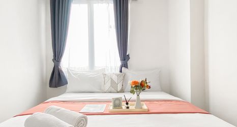 Phòng ngủ 2 Homey and Good Place 2BR Bassura City Apartment near Mall By Travelio