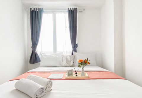Bedroom Homey and Good Place 2BR Bassura City Apartment near Mall By Travelio