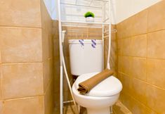 In-room Bathroom 7 Homey and Good Deal 2BR Green Pramuka City Apartment By Travelio