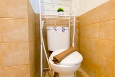 In-room Bathroom Homey and Good Deal 2BR Green Pramuka City Apartment By Travelio