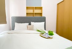 Bedroom 2 Homey and Good Deal 2BR Green Pramuka City Apartment By Travelio