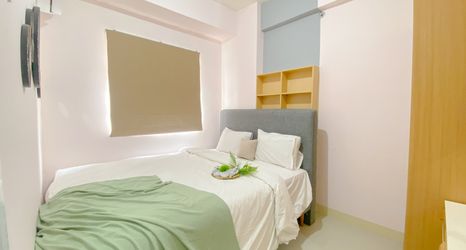 Bedroom 2 Homey and Good Deal 2BR Green Pramuka City Apartment By Travelio