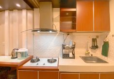 Common Space 5 Apartment 1BR with Direct Access to Pool at Parahyangan Residence By Travelio  