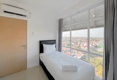 Bedroom 3 Restful and Spacious 3BR at Bale Hinggil Apartment By Travelio