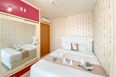 卧室 Comfort Stay and Strategic 2BR Apartment Woodland Park Residence By Travelio