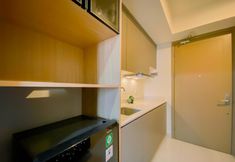 Ruang Umum 5 Modern and Good Place 1BR Gold Coast Apartment By Travelio