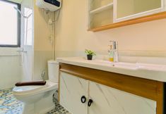 In-room Bathroom 7 Simply Look and Restful 2BR at Meikarta Apartment By Travelio