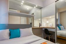 Kamar Tidur Strategic and Comfort 2BR Bassura City Apartment By Travelio