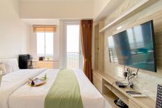 침실 Studio Restful at Apartment Tokyo Riverside PIK 2 By Travelio