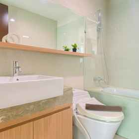 Bathroom 7 Nice and Comfort 2BR Apartment at Casa Grande Residence By Travelio, Apartemen Tebet