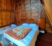 Bedroom 6 Flamingo cabin house dieng