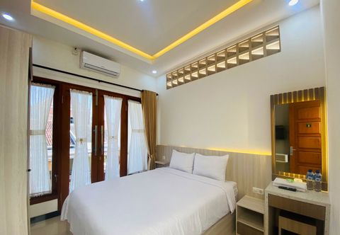 卧室 Kanggo Riko Family Homestay Mitra RedDoorz