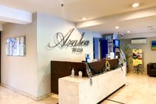 Lobi Modern Look Studio at Azalea Suites Apartment By Travelio