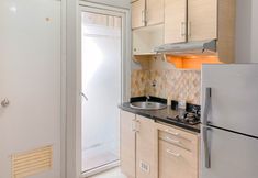 Common Space 7 Modern and Best Choice 2BR Green Pramuka City Apartment By Travelio