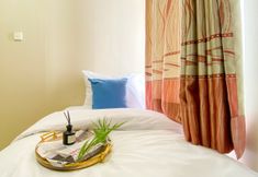 Others 2 Homey and Comfortable 3BR Green Bay Pluit Apartment By Travelio