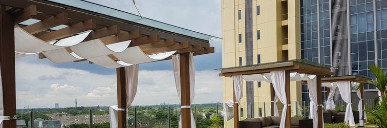 Lobby Well Furnished and Comfy 1BR Branz BSD City Apartment By Travelio