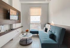 Common Space 3 Restful and Good Place 2BR at Patraland Urbano Apartment By Travelio