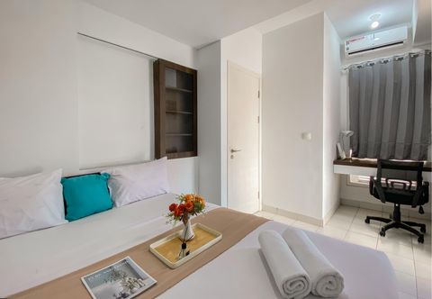 Bedroom Restful and Good Place 2BR at Patraland Urbano Apartment By Travelio