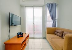 Common Space 3 Homey and Chic 2BR Apartment at Taman Melati Margonda By Travelio