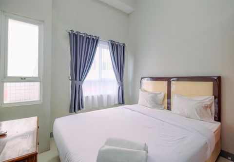 Bedroom Homey and Chic 2BR Apartment at Taman Melati Margonda By Travelio