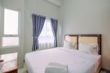 Bedroom Homey and Chic 2BR Apartment at Taman Melati Margonda By Travelio