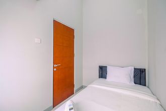 Bedroom 4 Homey and Chic 2BR Apartment at Taman Melati Margonda By Travelio