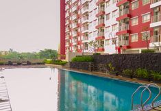Swimming Pool 6 Homey and Chic 2BR Apartment at Taman Melati Margonda By Travelio