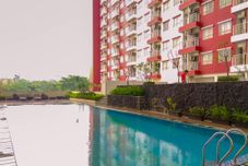 Swimming Pool Homey and Chic 2BR Apartment at Taman Melati Margonda By Travelio