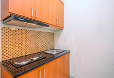 Common Space 4 Homey and Chic 2BR Apartment at Taman Melati Margonda By Travelio