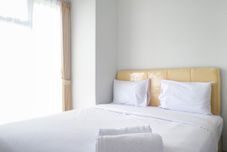 Bedroom Vibrant and Exquisite 2BR Apartment at Taman Melati Surabaya By Travelio