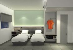 Bedroom 2 Amaris Hotel Manado