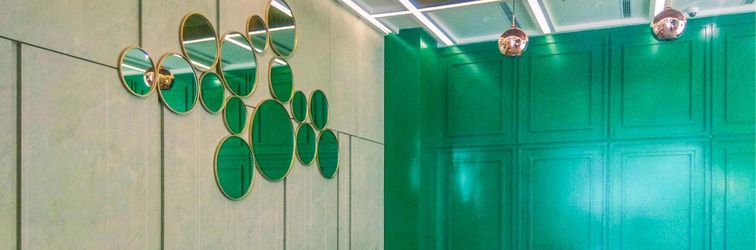 Lobby Minimalist and Comfy Studio Apartment at Evenciio Margonda By Travelio