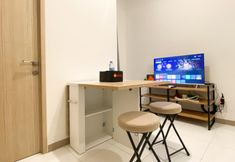 พื้นที่สาธารณะ 4 Homey and Tidy 2BR at Tokyo Riverside PIK 2 Apartment By Travelio