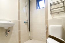 In-room Bathroom Comfortable and Good Deal 2BR Meikarta Apartment By Travelio