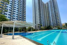 Swimming Pool Comfy and Well Furnished Studio at Springlake Summarecon Bekasi Apartment By Travelio