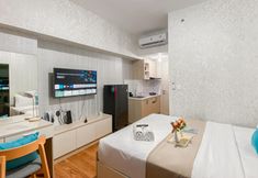 Bedroom 2 Comfy and Well Furnished Studio at Springlake Summarecon Bekasi Apartment By Travelio