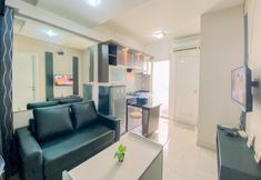 Common Space 3 Homey and Comfortable 2BR Green Pramuka City Apartment By Travelio