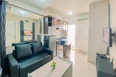 Common Space Homey and Comfortable 2BR Green Pramuka City Apartment By Travelio