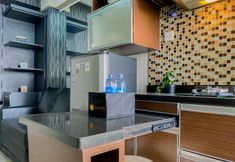 Common Space 4 Homey and Comfortable 2BR Green Pramuka City Apartment By Travelio