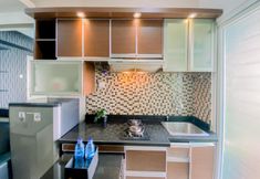Common Space 5 Homey and Comfortable 2BR Green Pramuka City Apartment By Travelio
