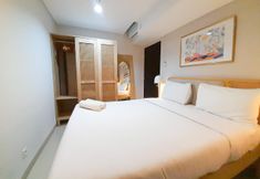 Bedroom 2 Comfort Stay and Cool 1BR at Patraland Amarta Apartment By Travelio
