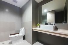 In-room Bathroom Comfort Stay and Cool 1BR at Patraland Amarta Apartment By Travelio