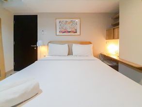 Bedroom 4 Comfort Stay and Cool 1BR at Patraland Amarta Apartment By Travelio