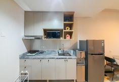 Common Space 6 Comfort Stay and Cool 1BR at Patraland Amarta Apartment By Travelio