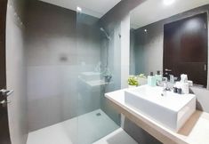 In-room Bathroom 7 Comfortable and Stylish Studio at Patraland Amarta Apartment By Travelio