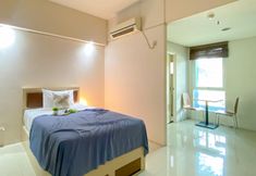 Bedroom 2 Comfy and Minimalist Studio at Habitat Apartment By Travelio